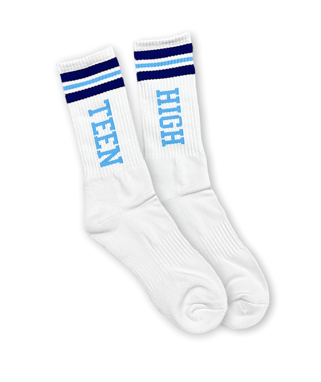 White gym socks with dark blue and light blue stripes at the top. One sock has the word TEEN down the side in light blue and the other socks has the word HIGH down the side in light blue.