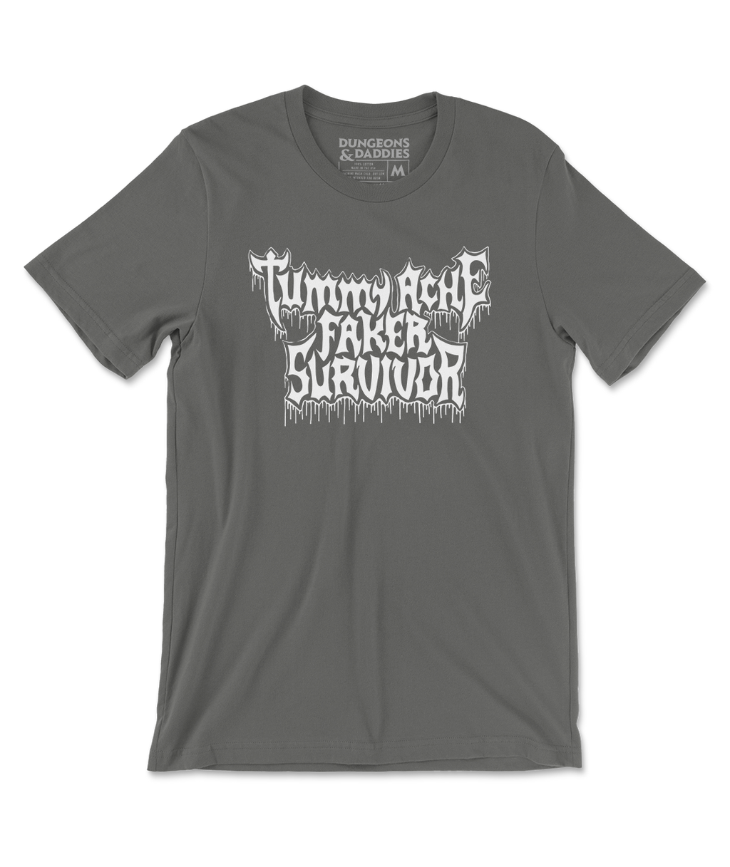 Asphalt gray shirt with words, "TUMMY ACHE FAKER SURVIVOR" written in rock band type font with drippy letters.